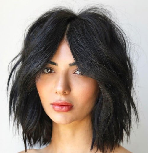 Edgy Medium Shag Haircuts with Modern Bangs 2024 Chic