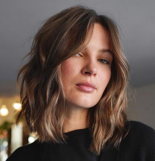 Undone Lob with Curtain Bangs 2024's Low-Maintenance Glam