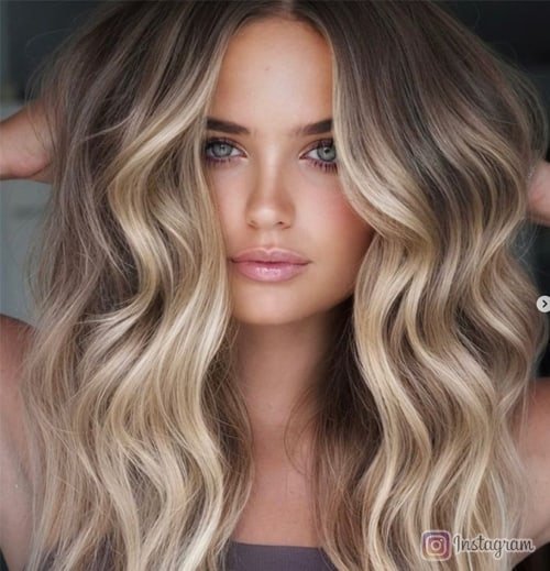 Feathery Layers and Balayage Blend Radiant Medium-Length Beauty