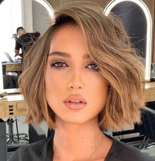 Sun-Kissed Bob with Side Bangs Effortless 2024 Hairstyles