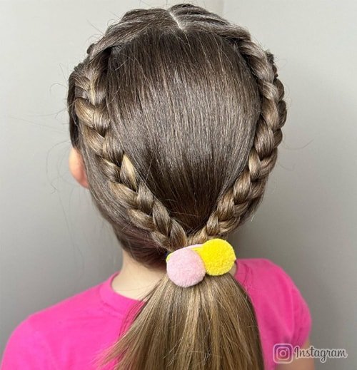 Ponytail with double twists for added flair.