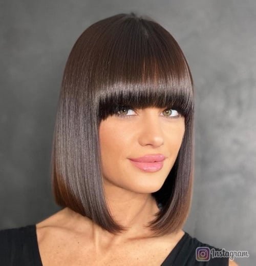 Sleek Bob Haircut with Long Fringe